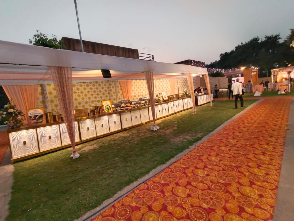 Illuminated Golden Buffet Counters & Red Carpet Aisle